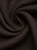 Close-up of dark brown fabric with a textured surface