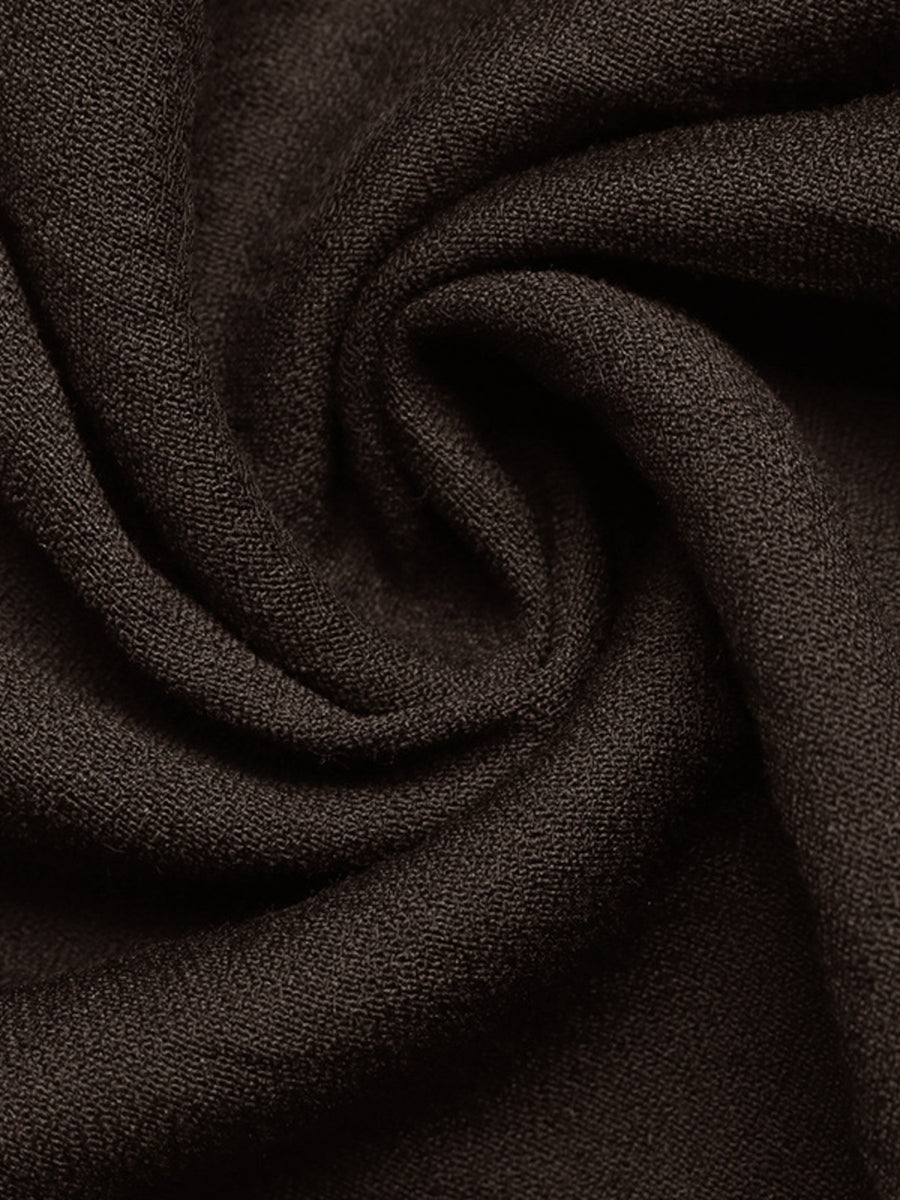 Close-up of dark brown fabric with a textured surface