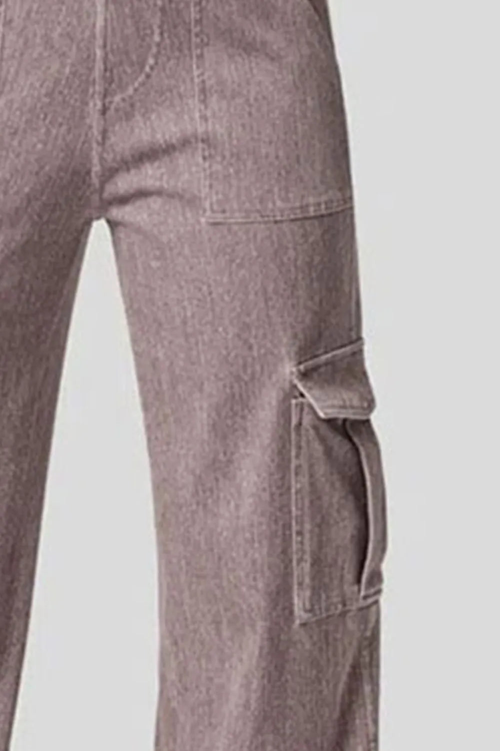 Close-up of gray cargo pants on a light gray background