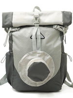 Gray and white backpack with a mesh pocket on a white background