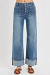 Wide-leg jeans with a button fly on a white background