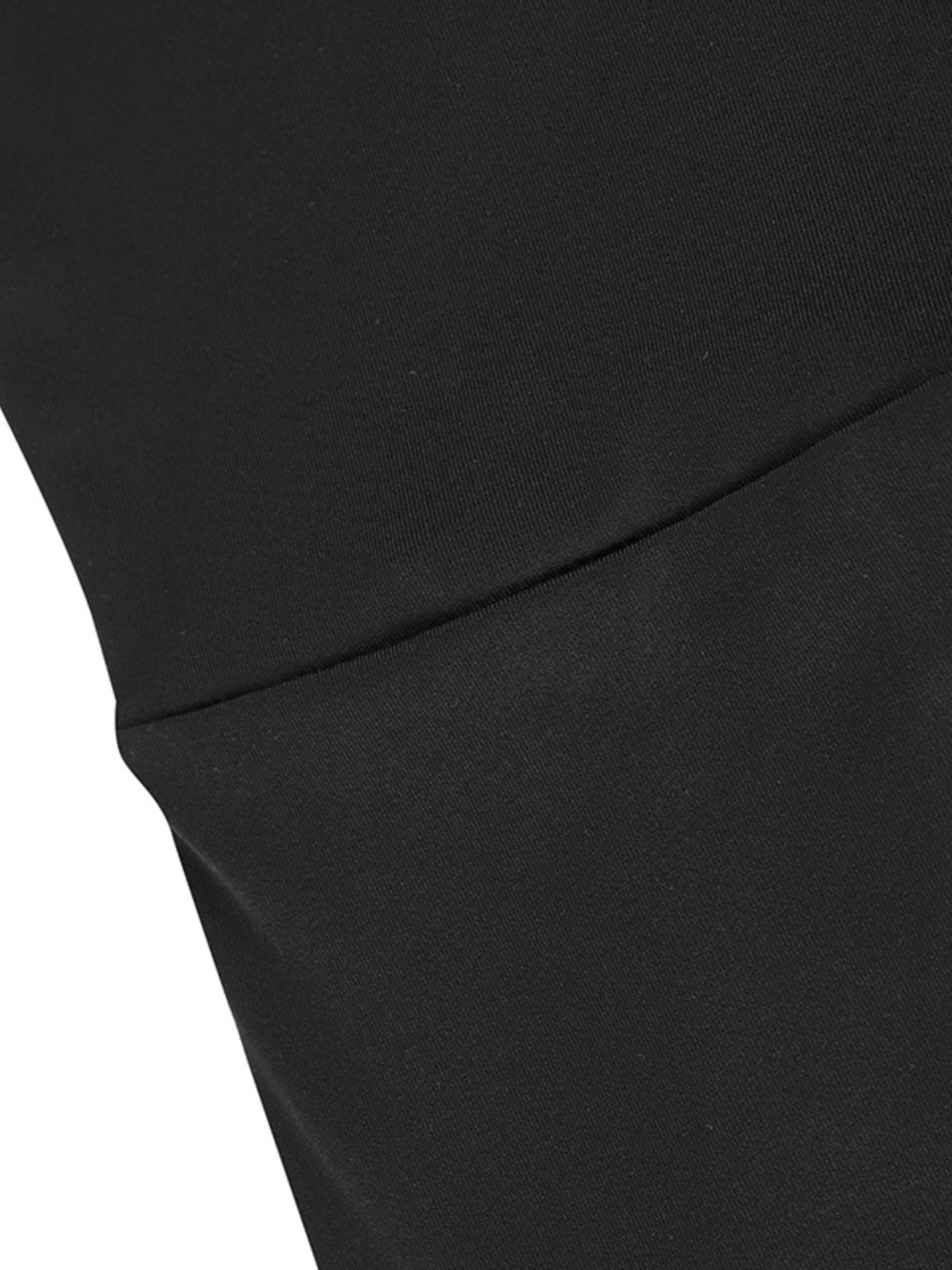 Close-up of a black fabric texture on a white background