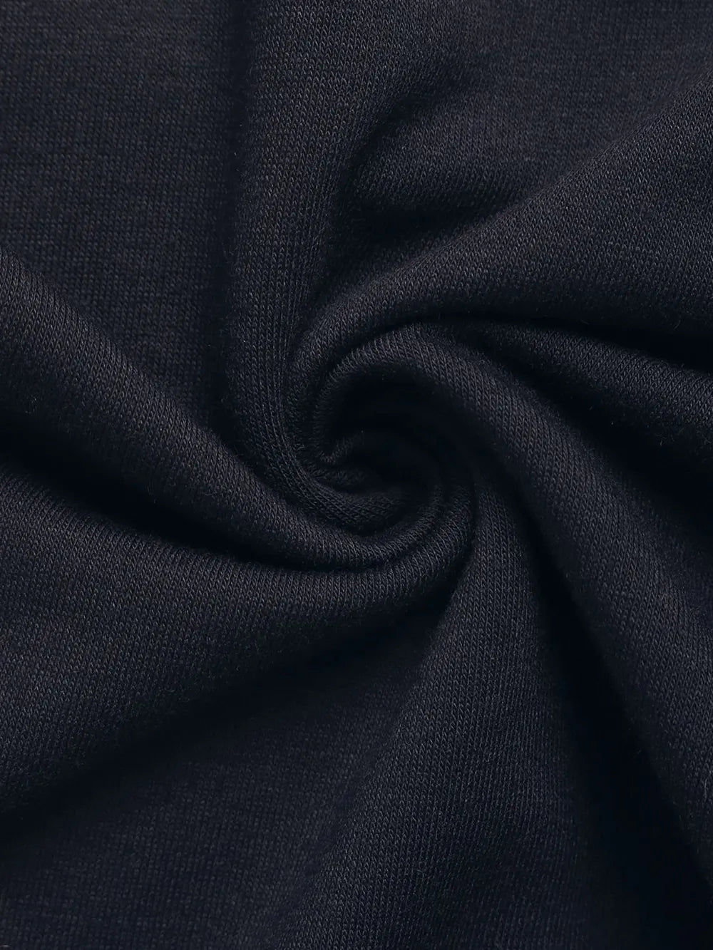 Close-up of dark blue fabric with folds
