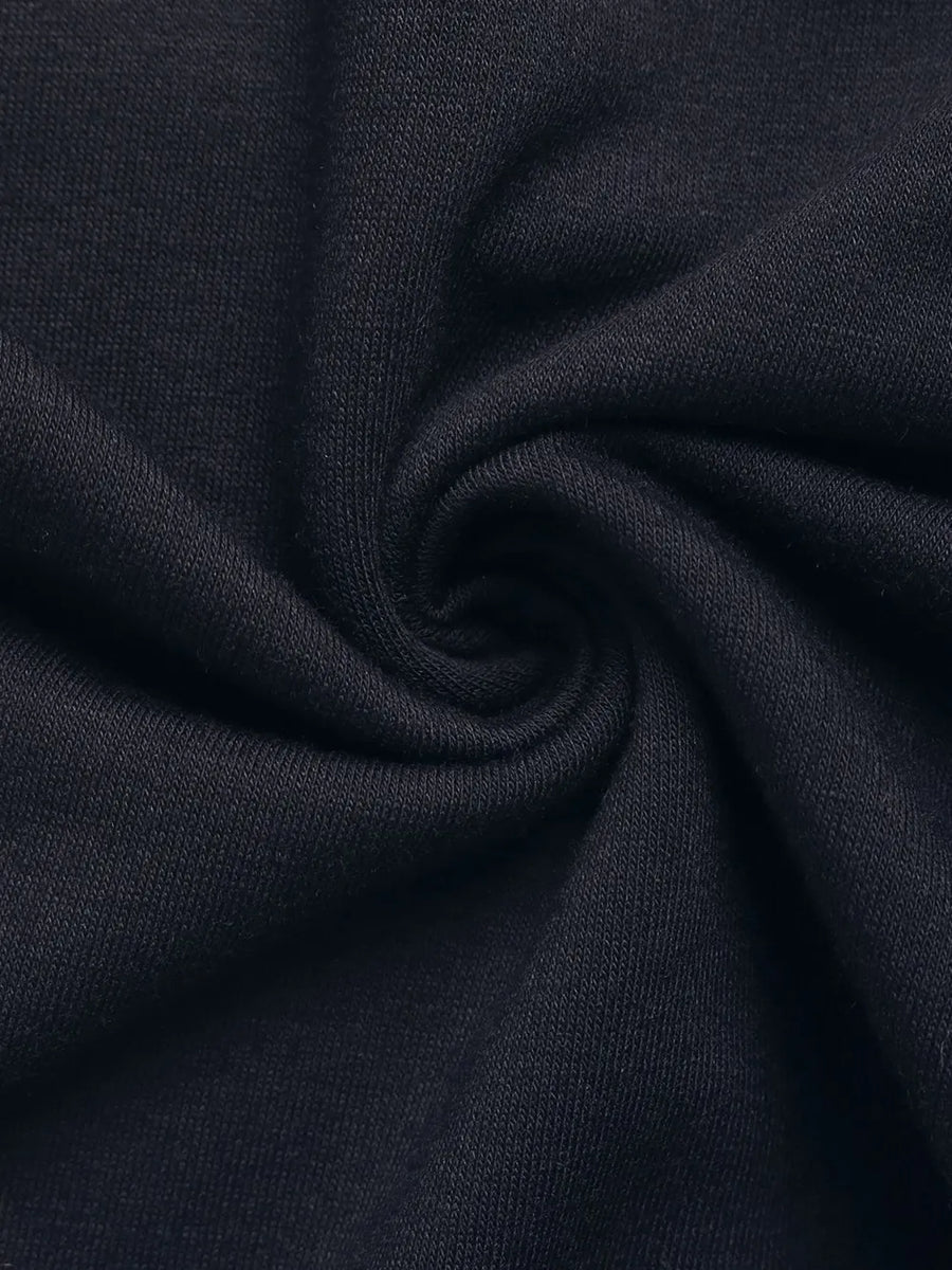 Close-up of dark blue fabric with folds