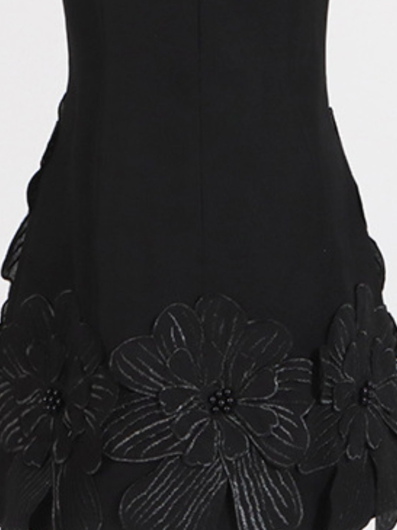 Black dress with floral embroidery on a white background