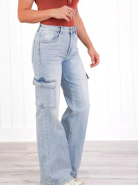 Light blue jeans worn by a person on a white background