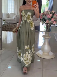 Woman wearing a floral dress in a living room setting