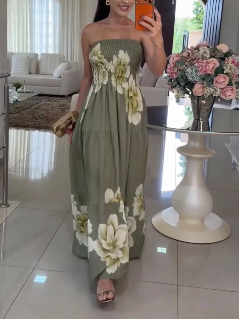 Woman wearing a floral dress in a living room setting