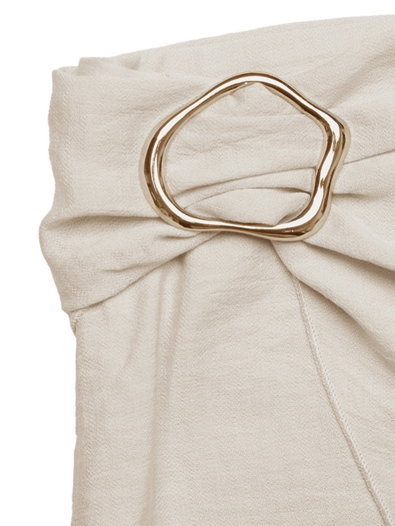 Beige fabric with a gold ring accent on a white background