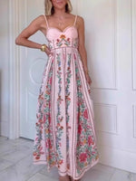 Woman wearing a floral dress with a white door in the background