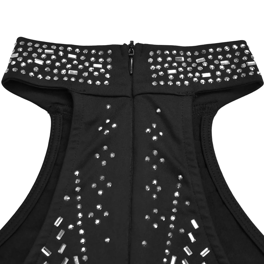 Black top with silver studded details on a white background