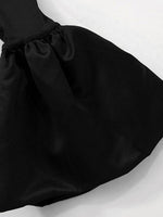 Black satin bow on a white background