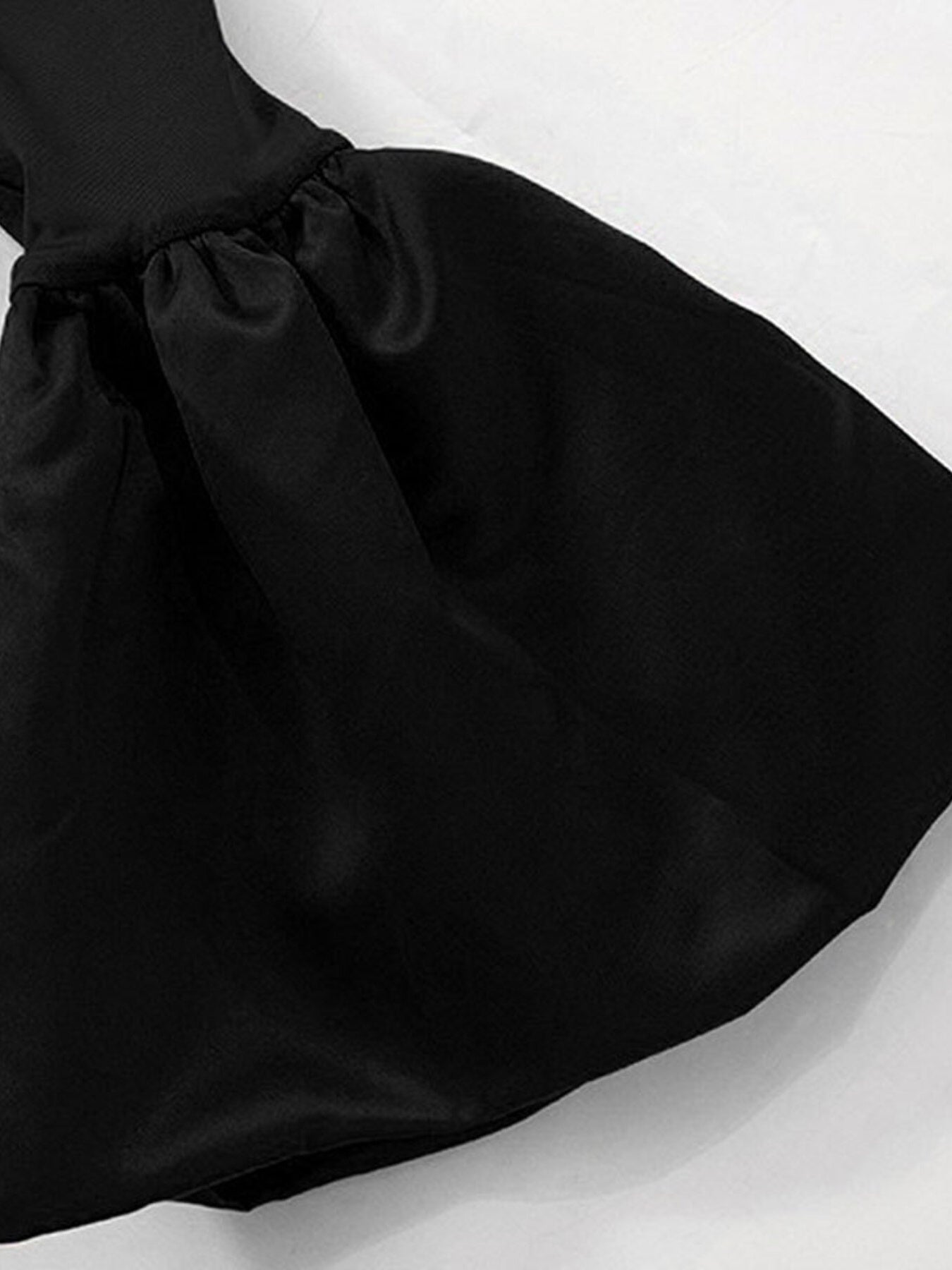 Black satin bow on a white background