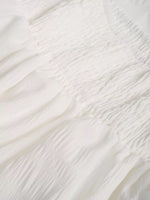 Close-up of textured white fabric