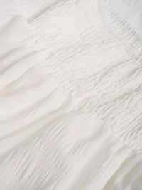 Close-up of textured white fabric