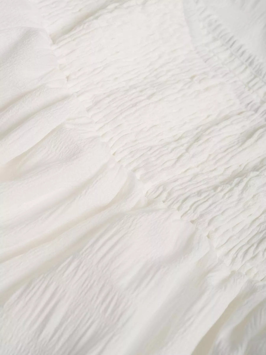 Close-up of textured white fabric