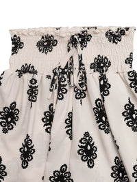White fabric with black floral patterns