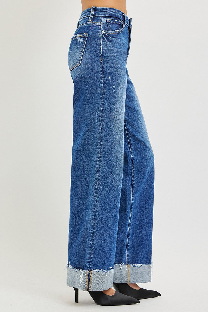 Blue wide-leg jeans on a white background