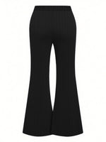 Black flared pants on a white background