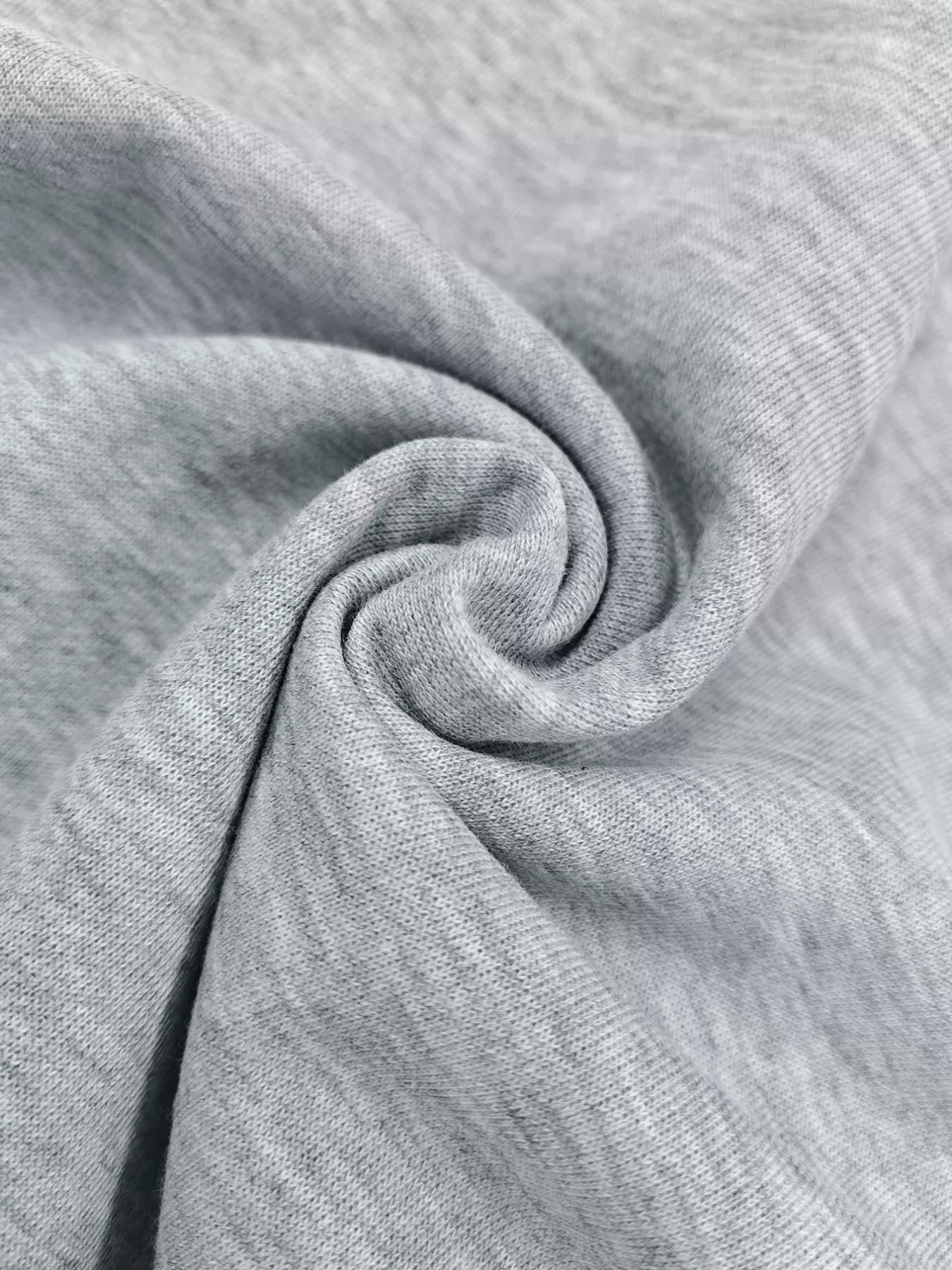 Close-up of gray fabric with a slight texture