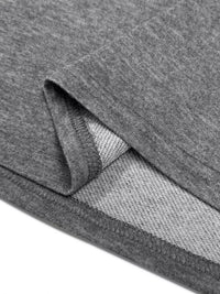 Close-up of gray fabric with a subtle pattern on a white background