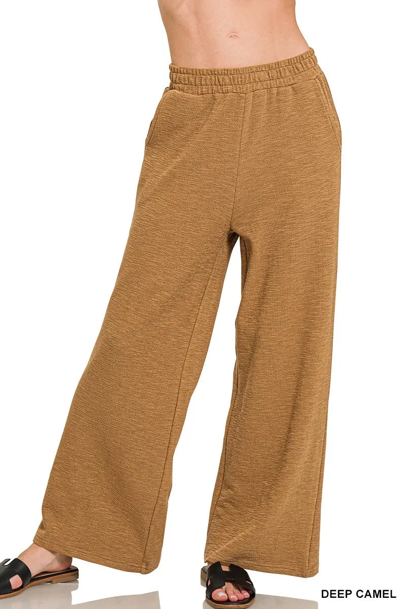 Brown wide-leg pants on a white background