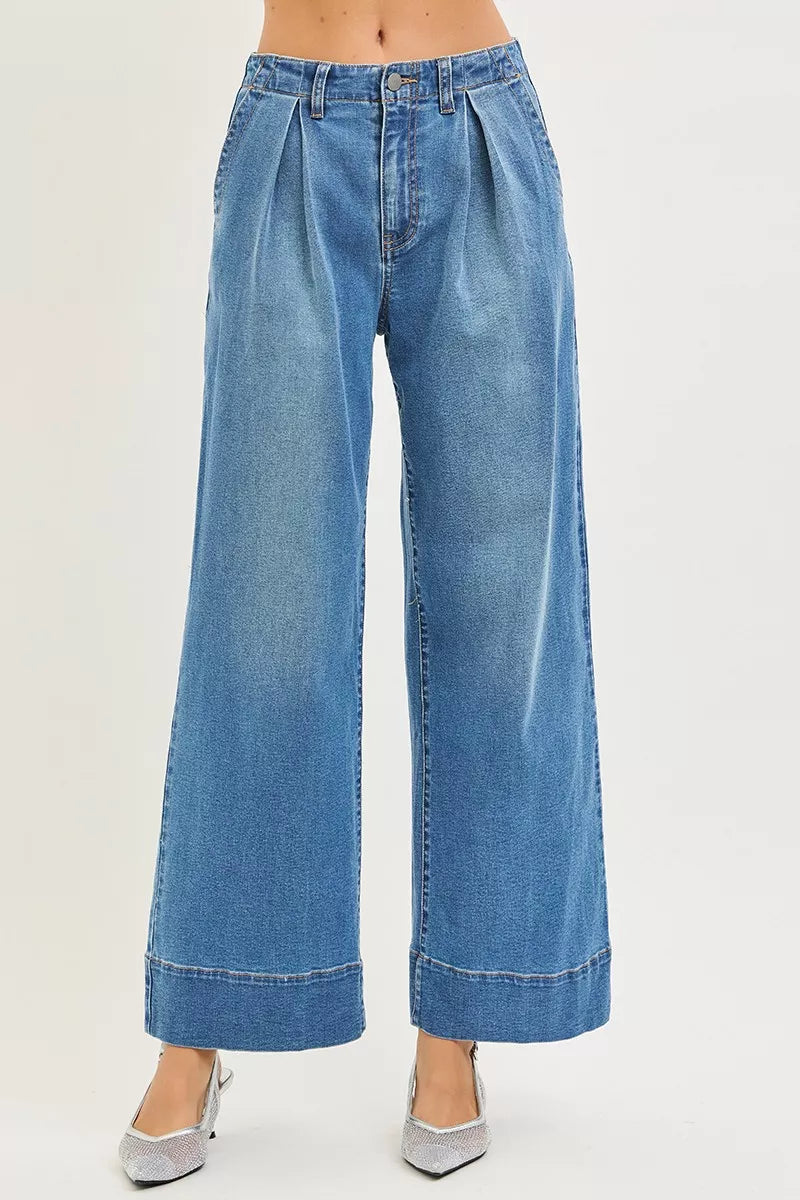 Blue wide-leg jeans on a white background