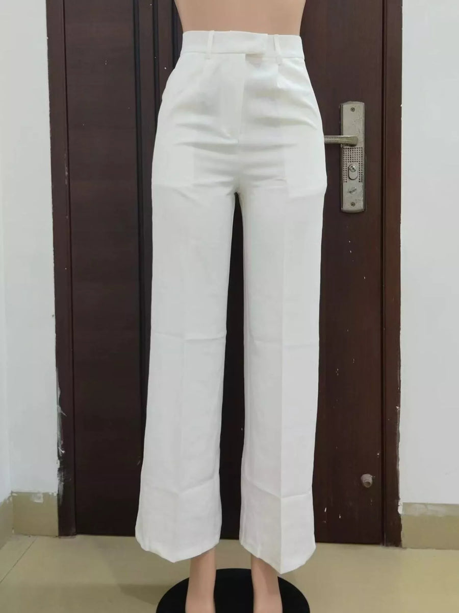 White pants displayed on a mannequin against a plain background