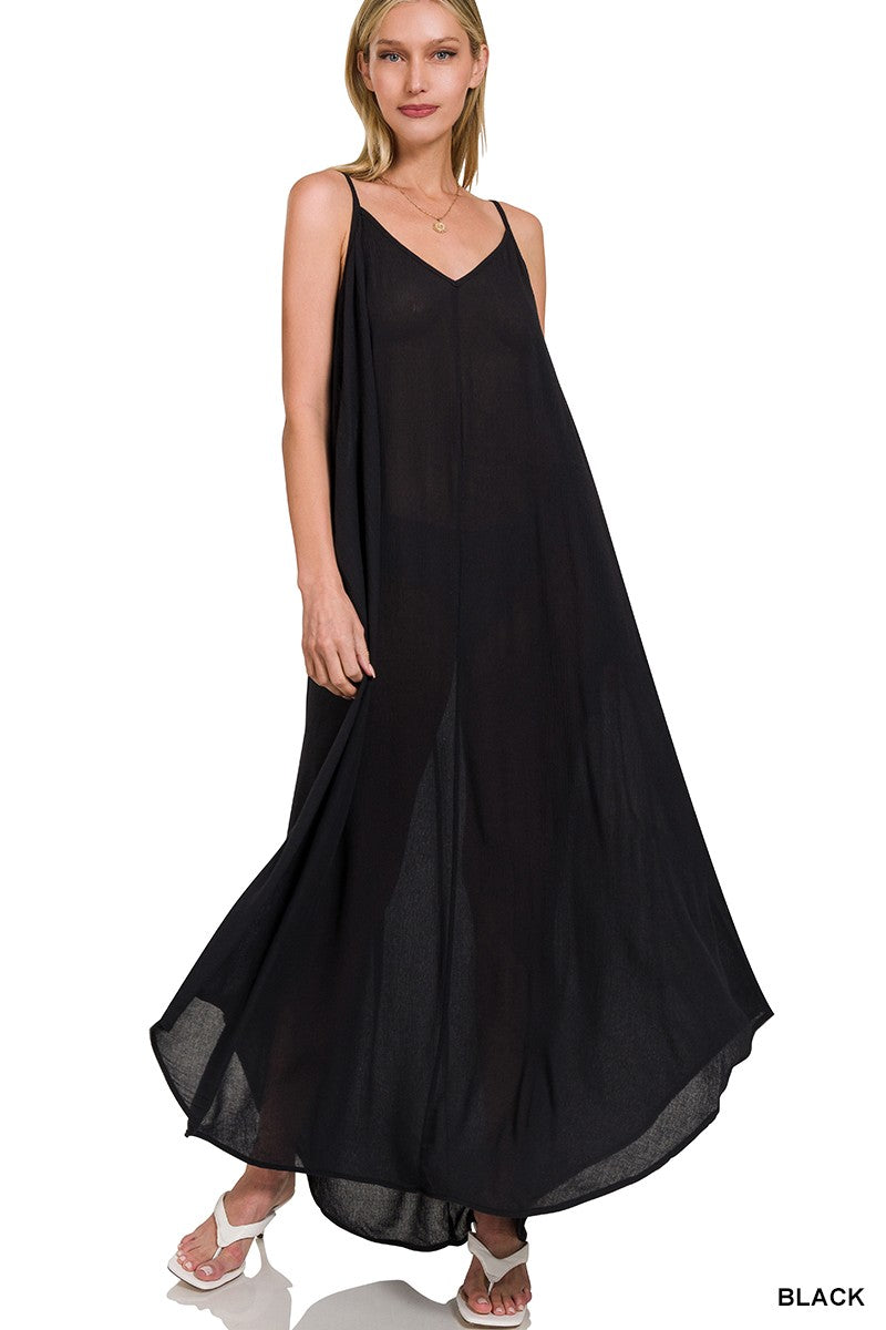 Woman wearing a black dress on a white background