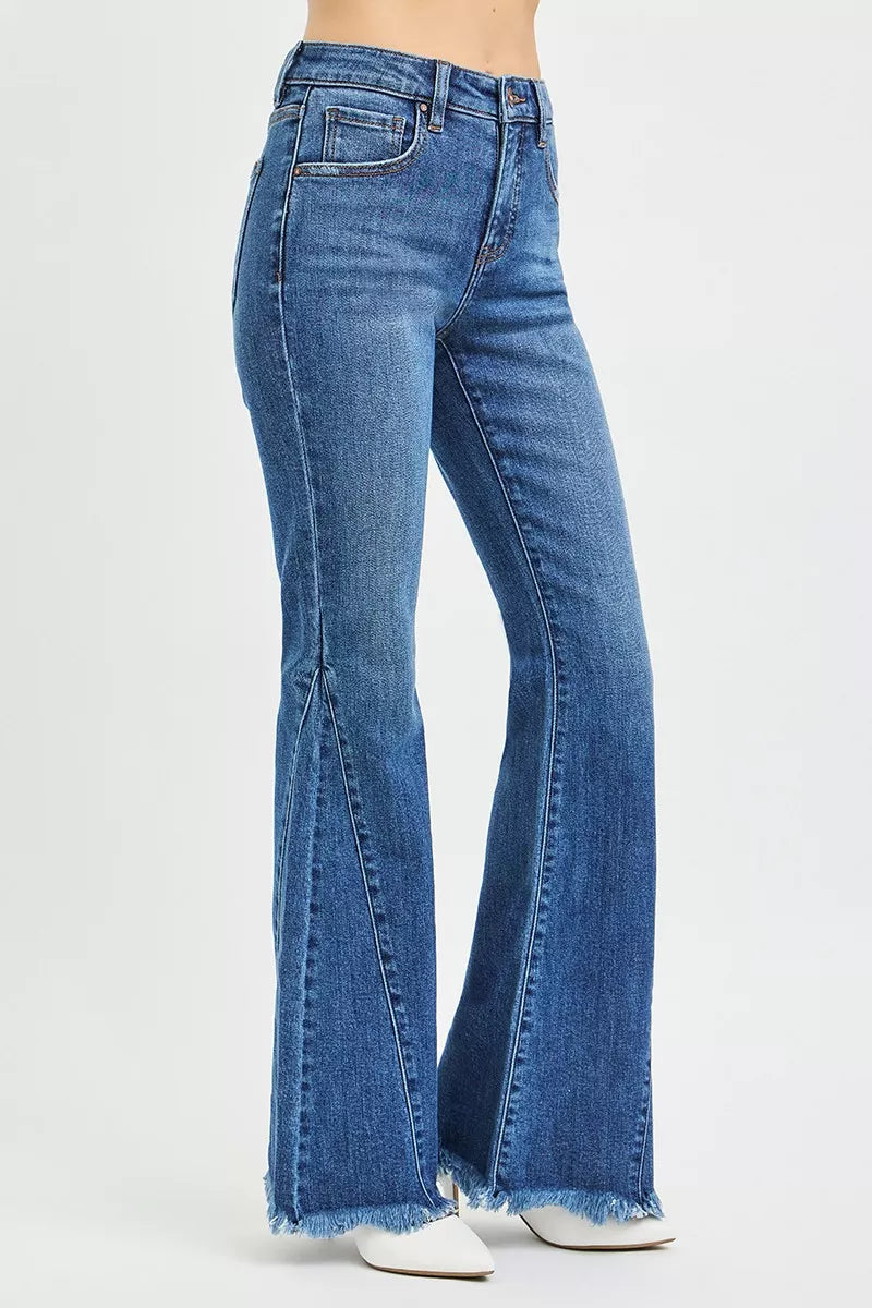 Blue flared jeans on a white background