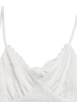 White strappy top on a white background