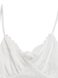 White strappy top on a white background