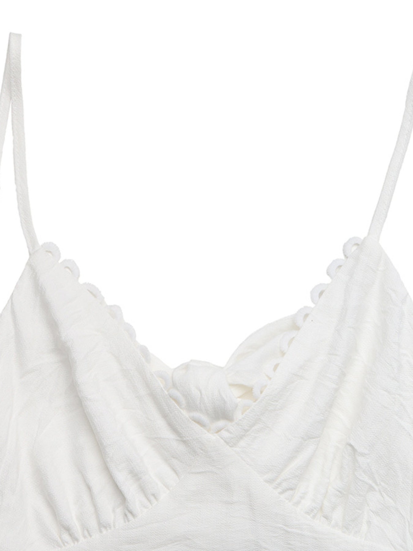 White strappy top on a white background