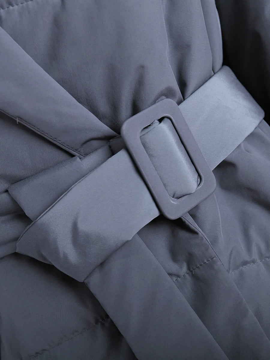 Gray coat with a belt and buckle close-up