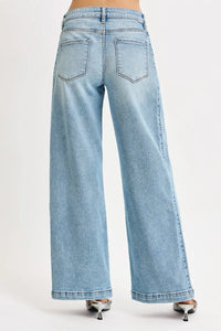 Light blue jeans on a white background
