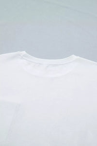 Close-up of a white t-shirt on a light gray background