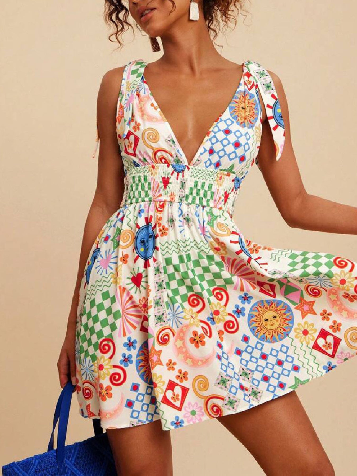 Woman wearing a colorful patterned dress against a beige background