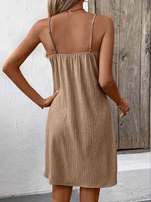 Back of brown Ivy Lane Textured V-Neck Sleeveless Mini Cami Dress