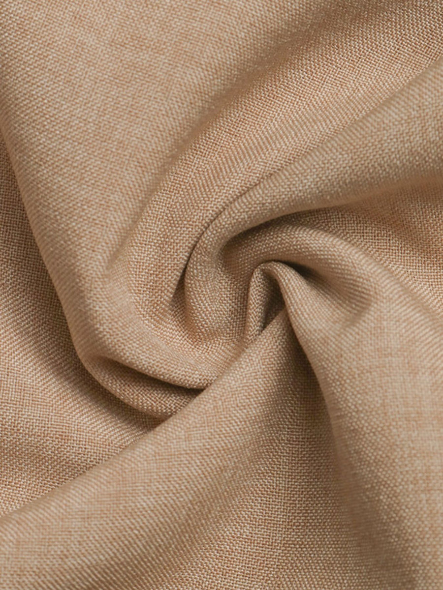 Close-up of beige fabric with a textured pattern