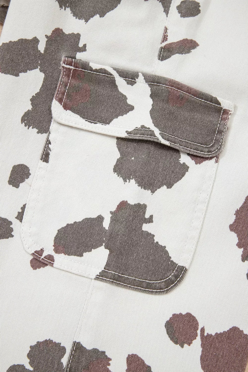 Close-up of a shirt with a cow print pattern