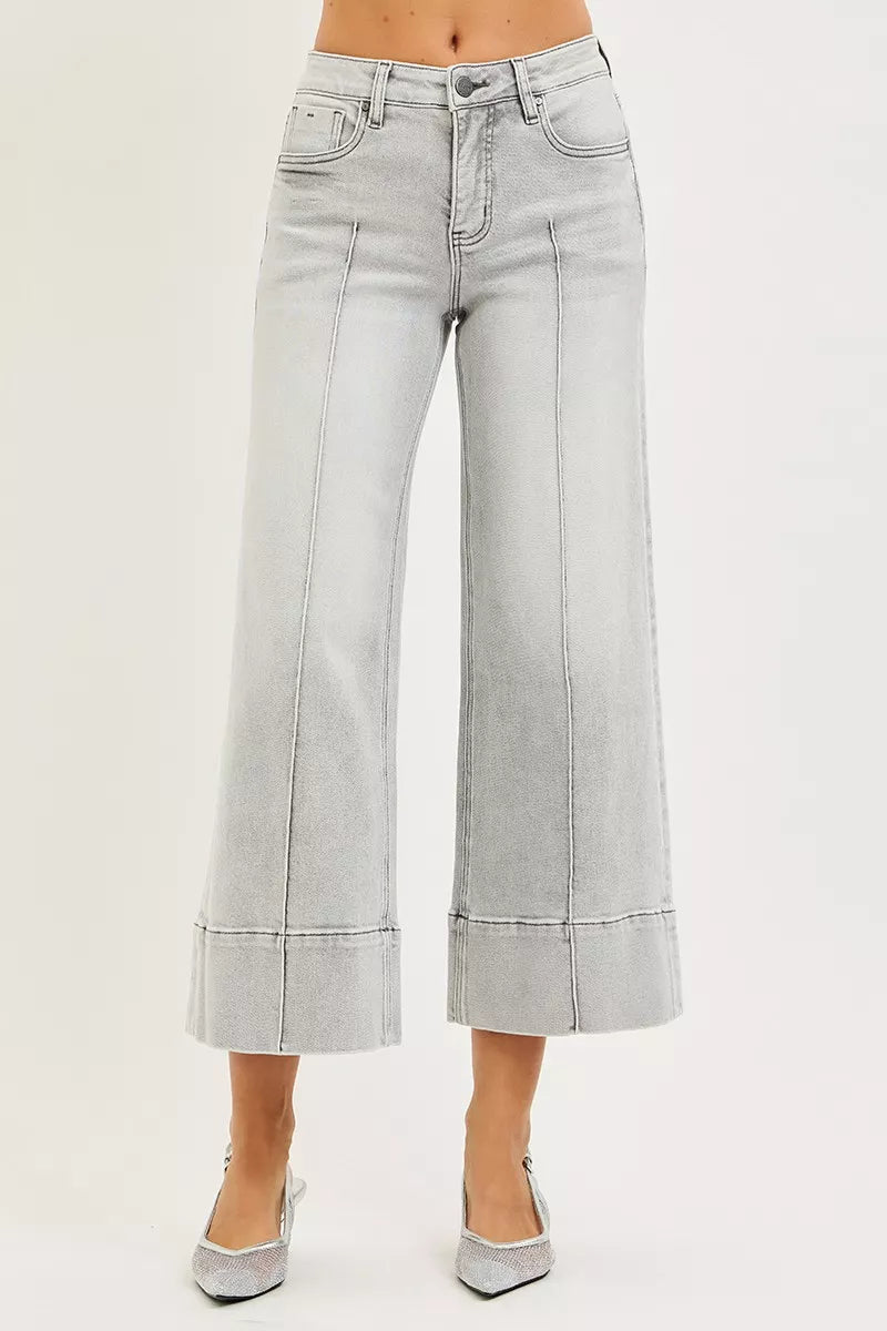 Light blue jeans with a white background