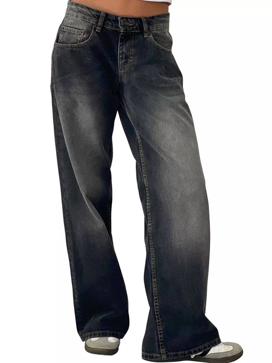 A pair of dark gray to black wide-leg denim jeans with a faded wash, shown on a model from the waist down against a plain white background.