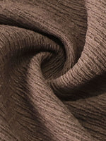 Close-up of brown textured fabric