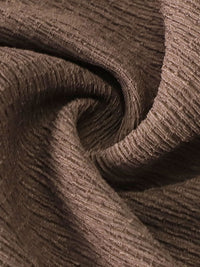 Close-up of brown textured fabric