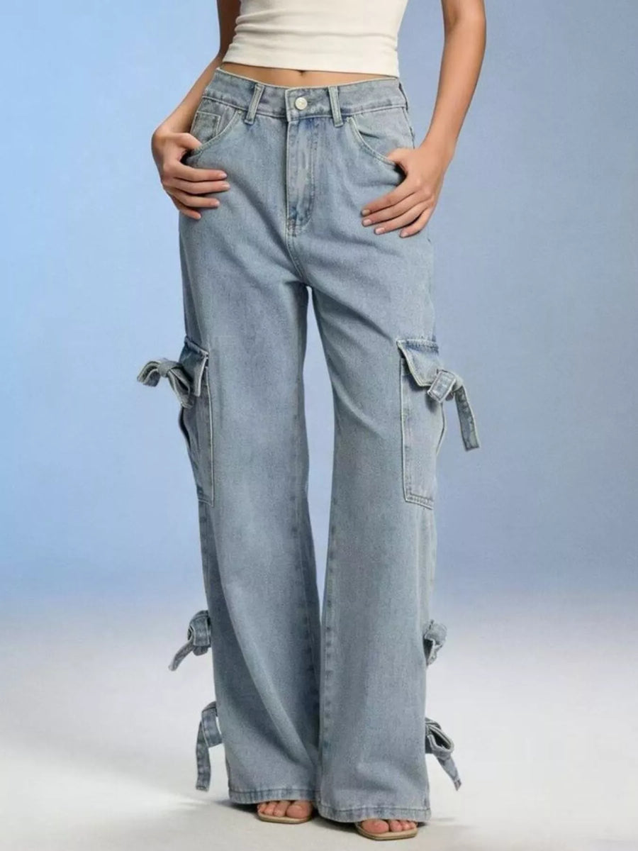 Light blue cargo pants worn by a person on a plain background