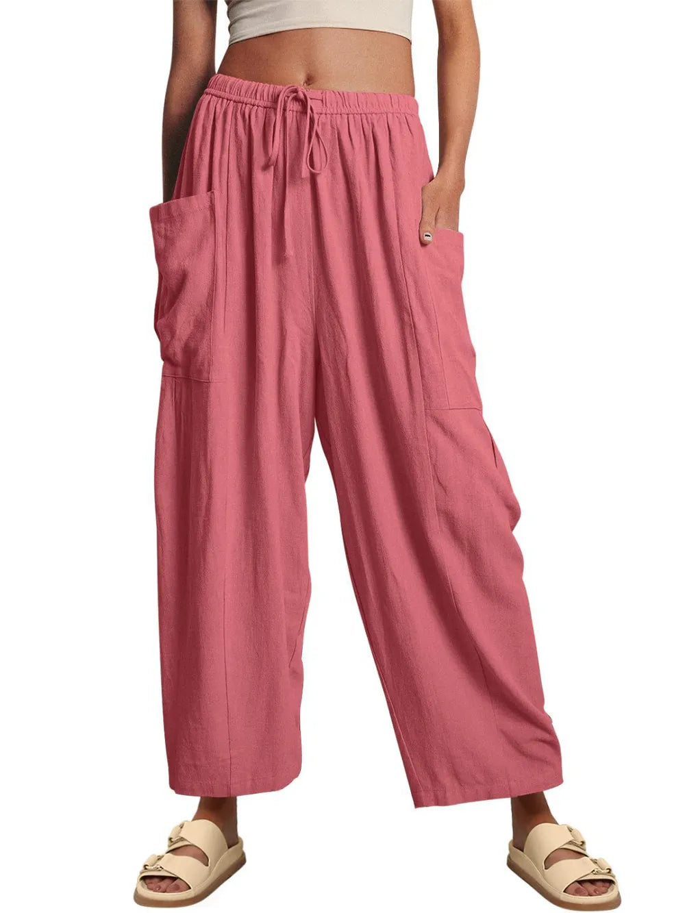 Woman showing pockets on baggy pants