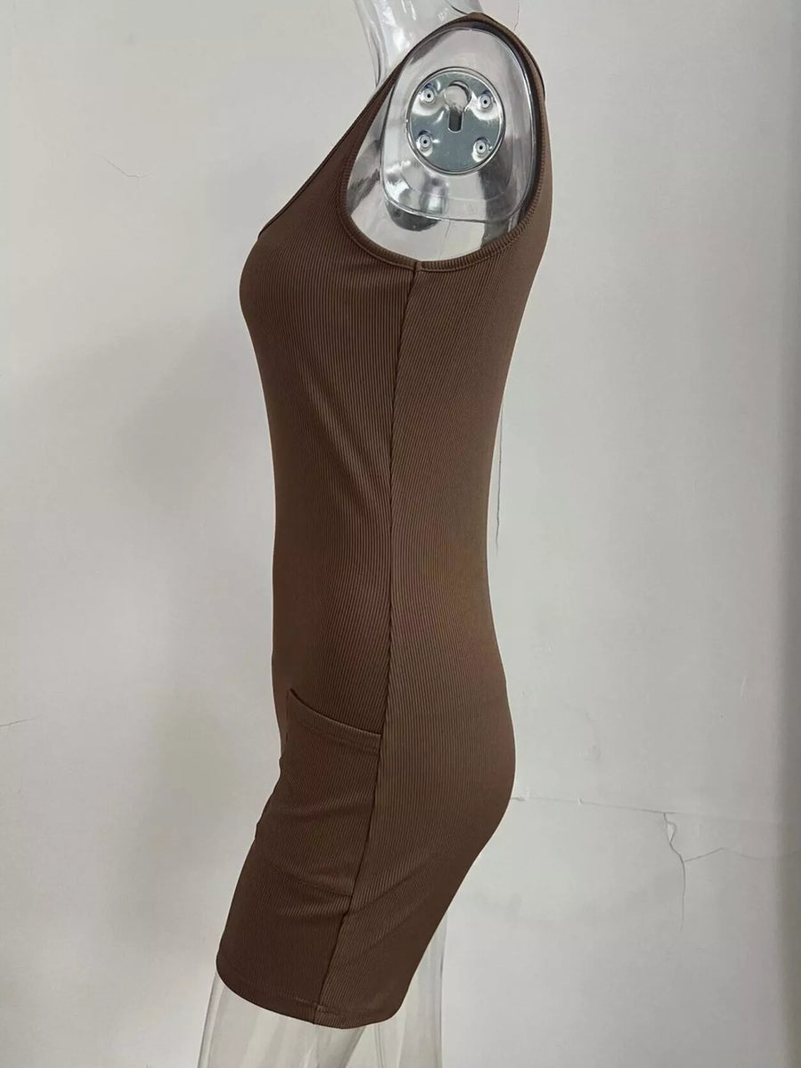 Brown dress on a mannequin against a white background
