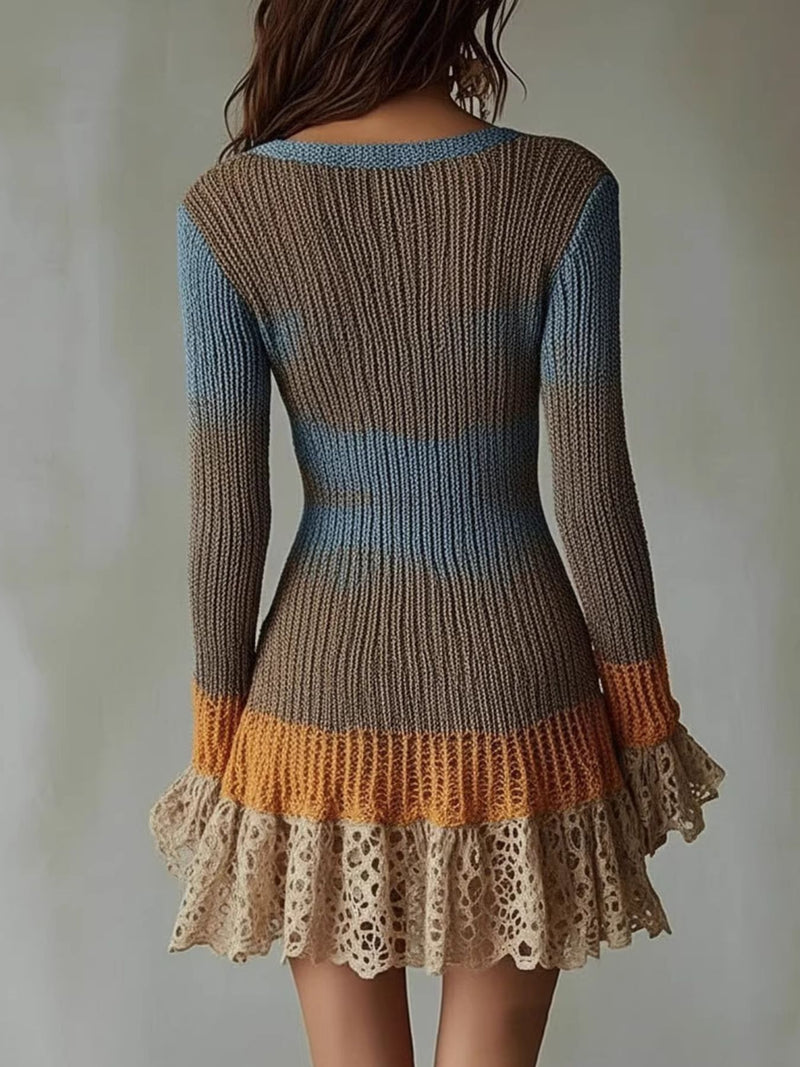 Knitted dress with gradient colors and lace details on a plain background