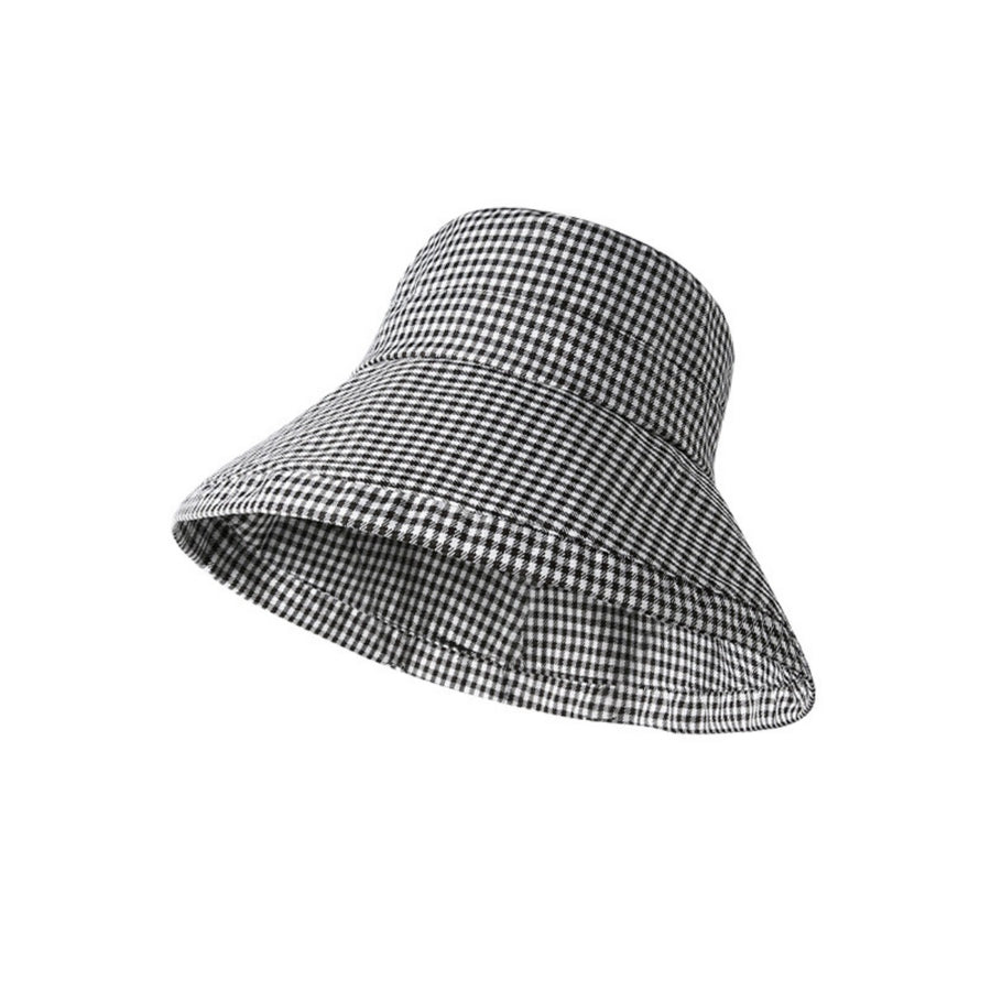 Black and white checkered sun visor hat on a white background