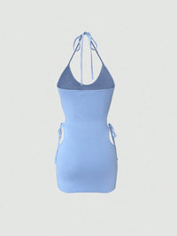 Light blue halter neck dress on a light gray background